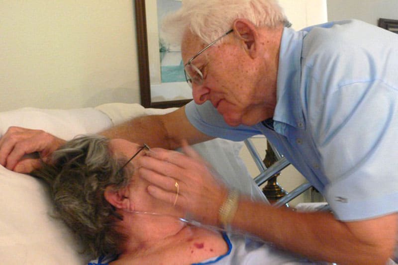 Loving elderly couple at hospice