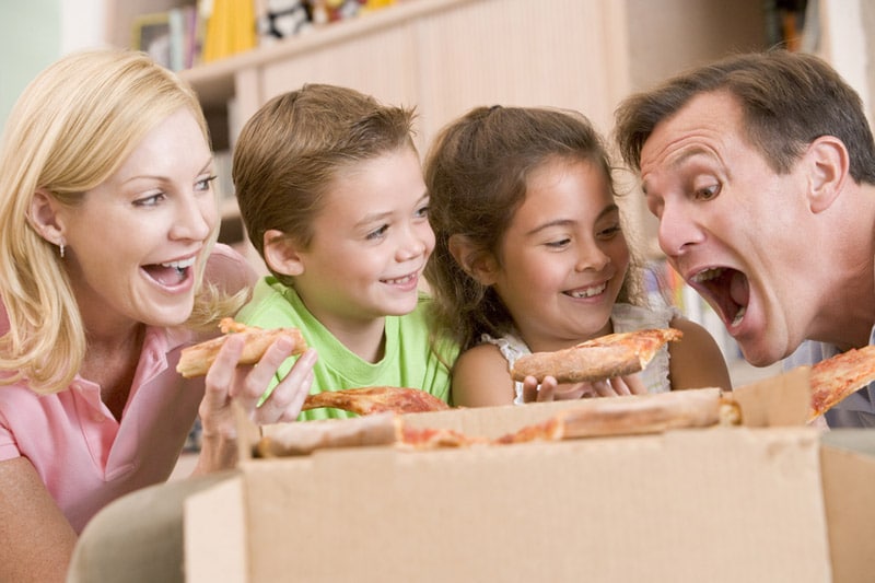 Happy family eating