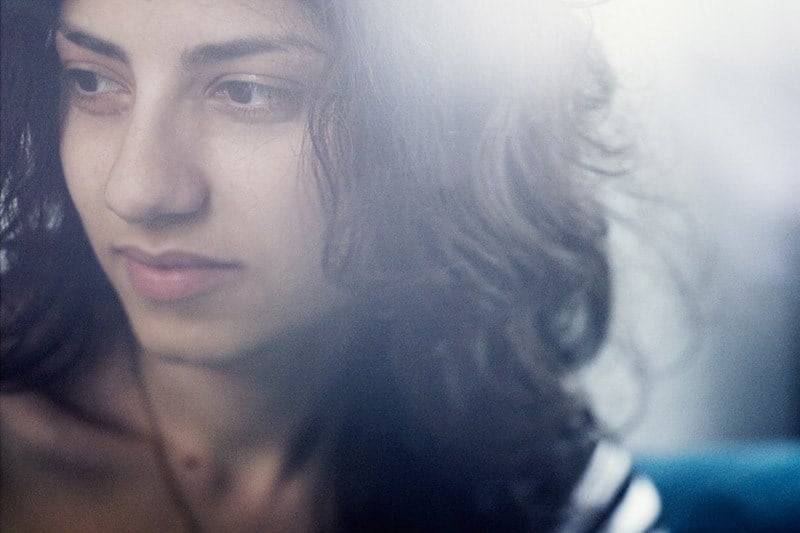 Girl with an apprehensive smile