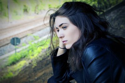Sad girl looking out into the distance