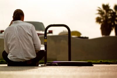 Back view of a guy, alone by himself