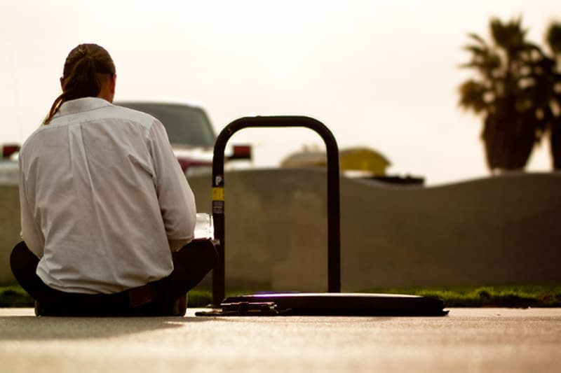 Back view of a guy, alone by himself