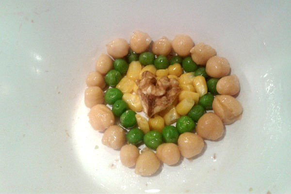 Peas, arranged in a heart shape