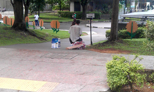 Back view of the street performer