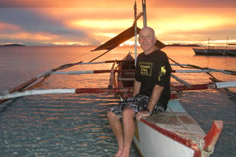 Larry at the sea, during sunset
