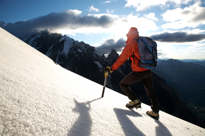 Man climbing mountain