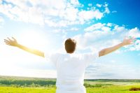 Man with arms outstretched