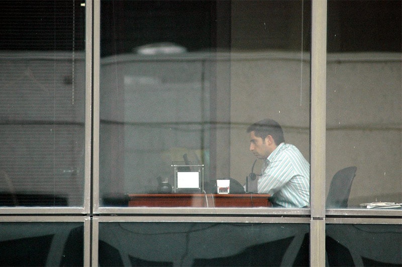 Sad man alone in the office