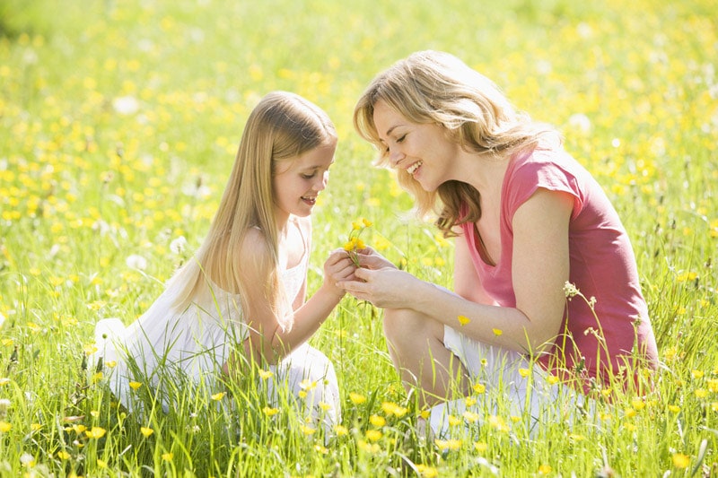 Mother and daughter on the field