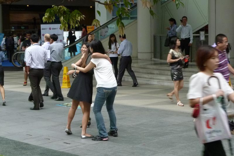 Celes hugging two Chinese girls