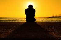 Silhouette of a man, before a sunrise