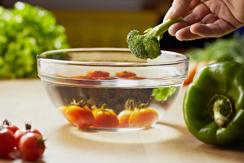 Vegetables and broccoli, put in a bowl