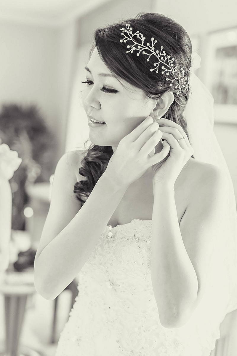 Wearing earrings